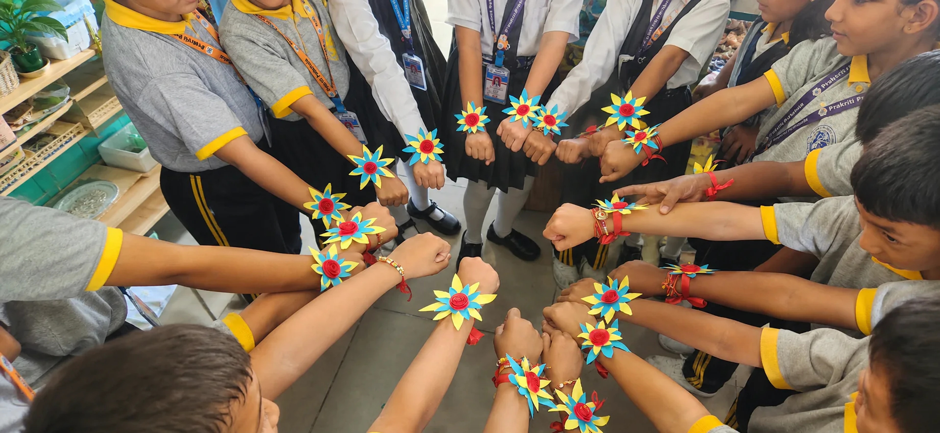Prakriti Pathshala learners sharing handmade flowers created together